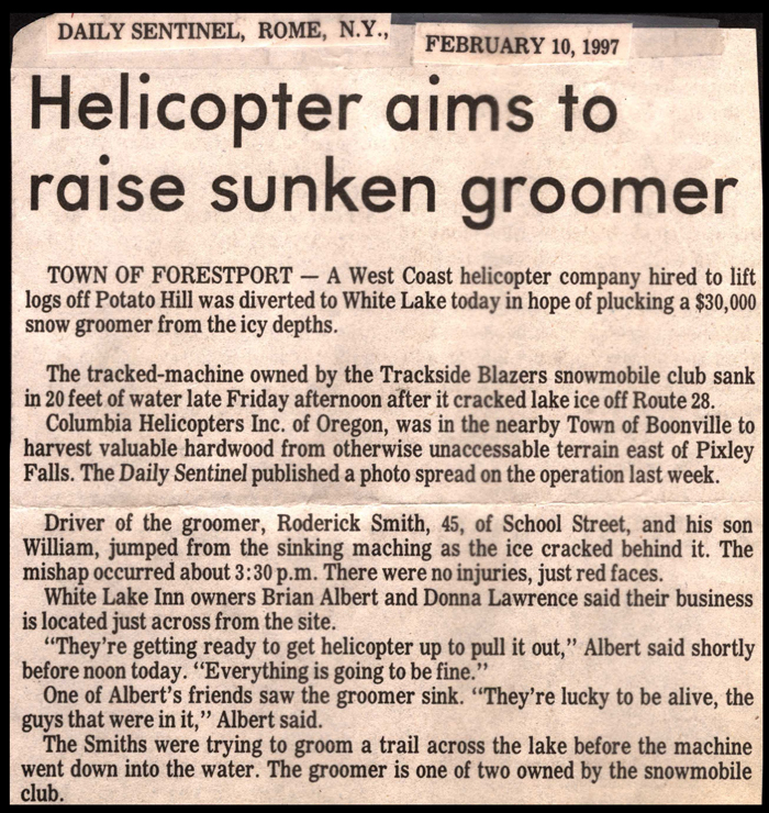 helicopter aims to raise sunken trackside blazers snow groomer february 10 1997